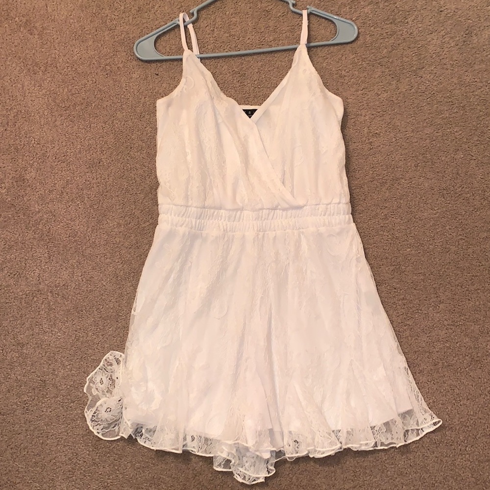 White romper with straps